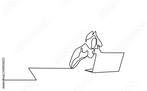 a female employee with a laptop on the desktop making a video call and making explanations