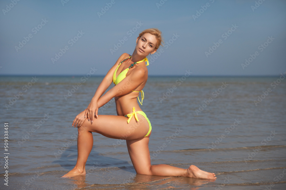 young beautiful woman in swimsuit young beautiful woman in swimsuit