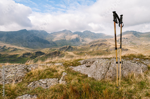 Walking poles and view of the Scafell Range in the English Lake District