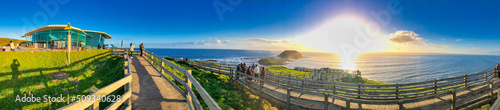 Phillip Island, Australia - September 7, 2018: The Nobbles viewpoint at sunset with tourists, panoramic aerial view photo