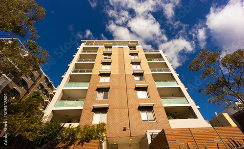 Residential high rise apartment building in inner Sydney suburb NSW Australia. Residential complex in leafy suburbia. Urban living high density suburban city 