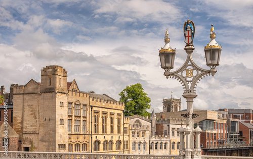 Historic building and ornate lamp.