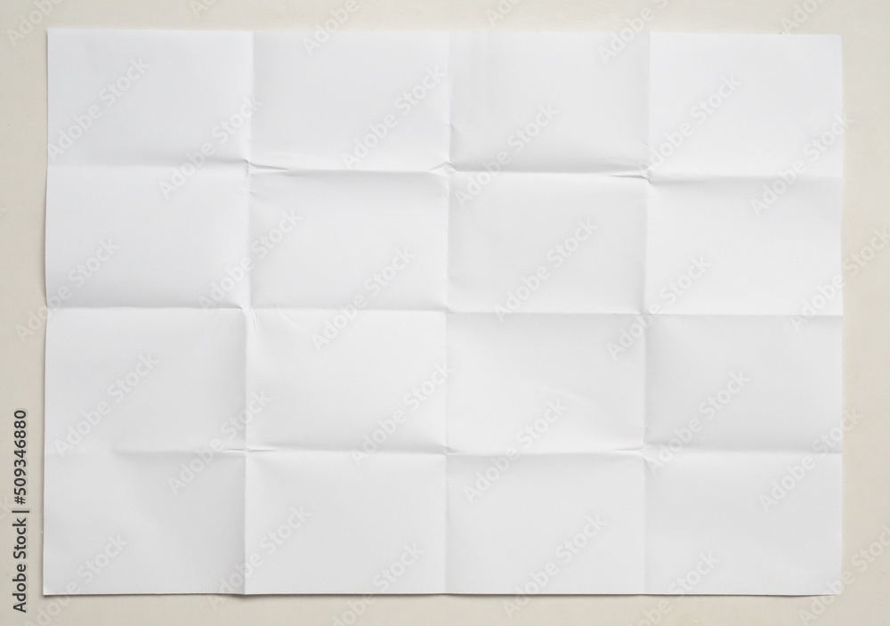 White folded and wrinkled paper on white background White folded and wrinkled paper on white background