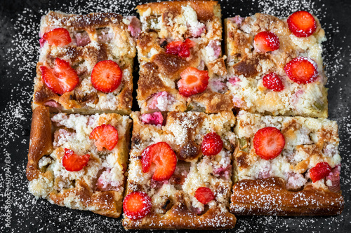 Wallpaper Mural Fruity cake with strawberry and rhubarb on black pan. Torontodigital.ca