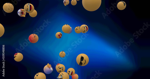 Image of multiple emojis falling over dark background