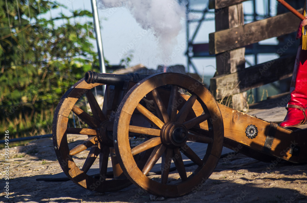 A cannon during an artillery show. Historical reenactment