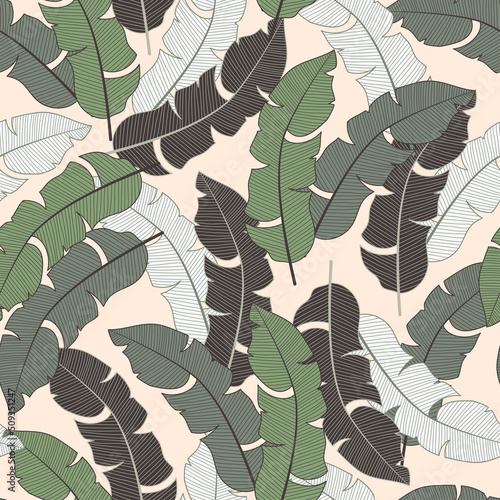 Fashionable seamless tropical pattern with bright plants and leaves on a delicate background. Modern abstract design for fabric, paper, interior decor. Exotic wallpaper.