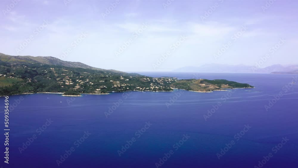 Corfu island mediterranean blue coast in sunny day. Aerial view Corfu island mediterranean blue coast in sunny day. Aerial view