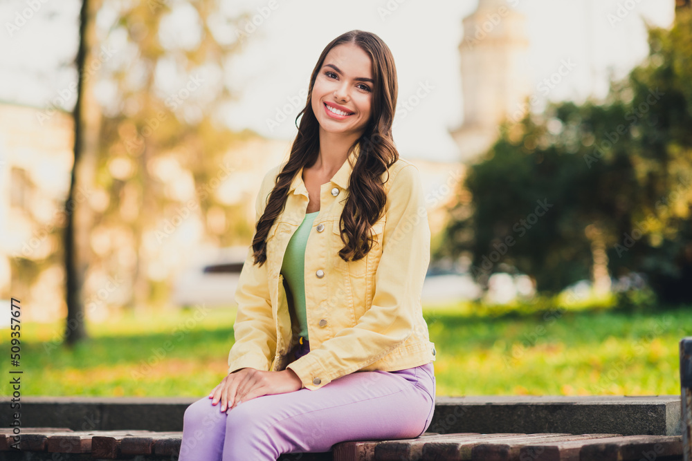 Portrait of attractive pretty cheerful long-haired girl spending vacation tour traveling visit new country place outdoors Portrait of attractive pretty cheerful long-haired girl spending vacation tour traveling visit new country place outdoors