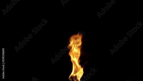 Fire Small Turbulent Source Isolated on Black Background in 4K Resolution and 30fps conformed from 50fps photo