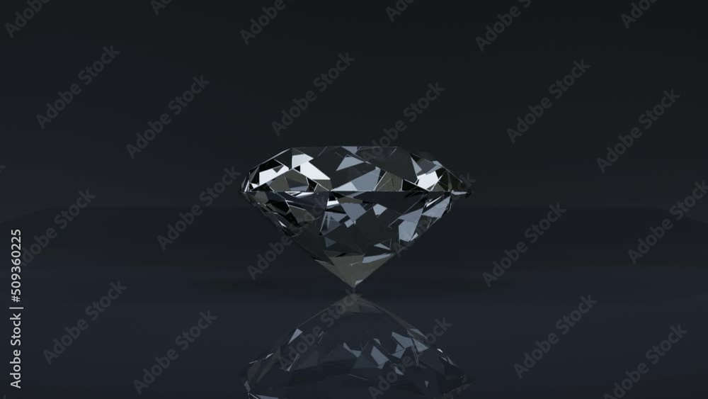 diamond zooming in and spinning on black background