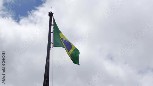 flag of brazil in brasilia at the three powers square photo