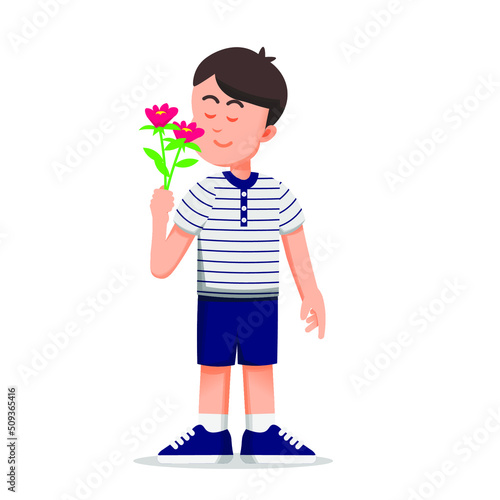 a boy smells a flower in his hand