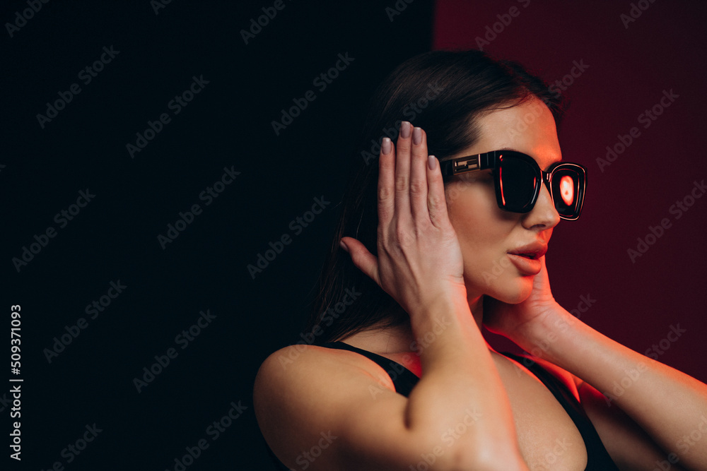 Woman in swimwear isolated in studio on background Woman in swimwear isolated in studio on background