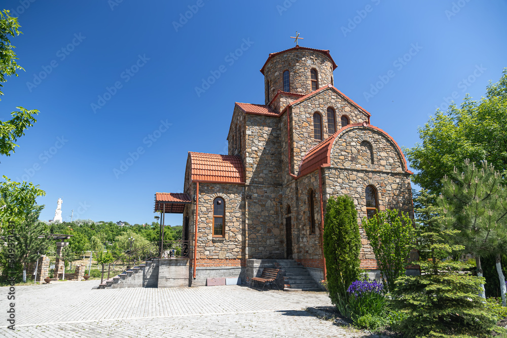 Orthodox church lined with stones in the style of temples of fire-worshippers