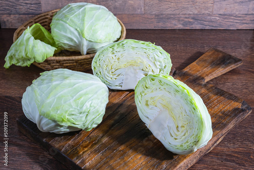 Prepare the cabbage to cook on the kitchen table.