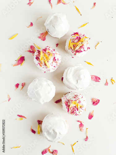 Quadro em tela Cake with edible flowers and whipped cream. Shallow dof .