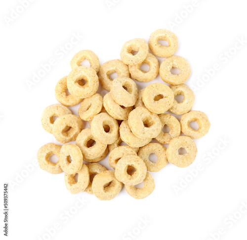 Pile of tasty corn rings on white background, top view. Healthy breakfast cereal