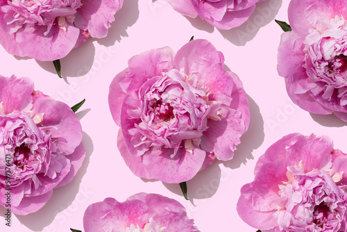 bright pink peonies pattern on a pastel pink background © World of AI