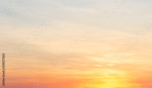 Billede på lærred Orange, yellow bright sunrise sky clouds in the morning background