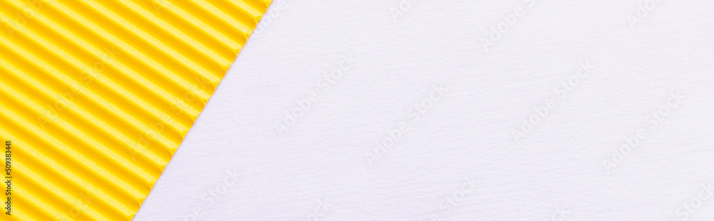 top view of bright yellow textured paper on white background, banner. - obrazy, fototapety, plakaty 