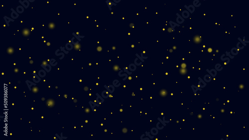 Yellow sparkling dust particles