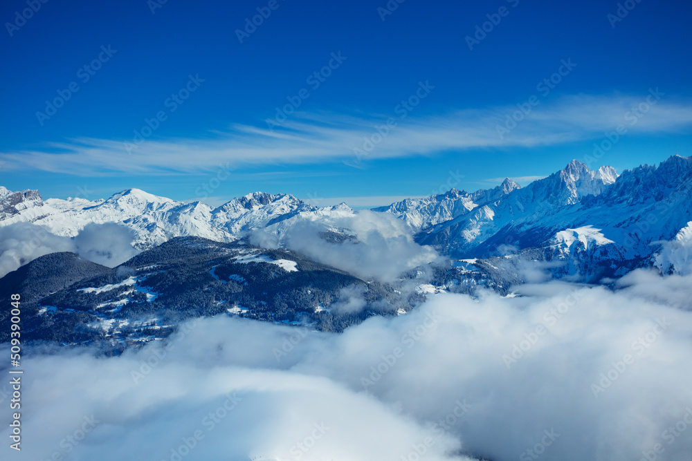 Panorama above clouds of Alps mountains and Mont Blanc massif Panorama above clouds of Alps mountains and Mont Blanc massif