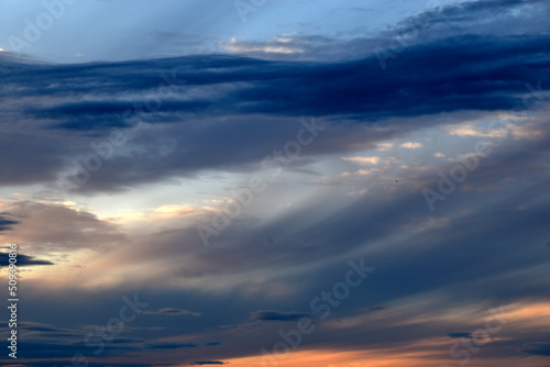 Sunset horizon in the evening bright yellow red clouds