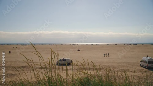 Panoramic view of the beach of  Rømø with parking caravans near the coast