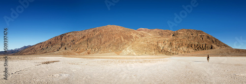 Badwater panorama, Death Valley, USA. The barren salt flats here are below sea level.  photo