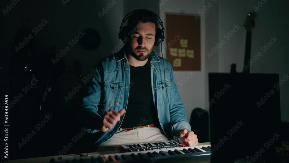 Young hispanic man artist smiling confident having video call at music studio Young hispanic man artist smiling confident having video call at music studio