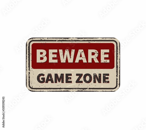 Beware game zone vintage rusty metal sign on a white background, vector illustration