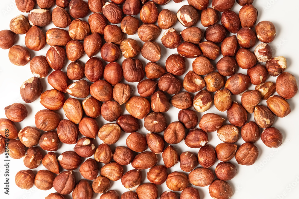 Peeled HazelnPeeled Hazelnut on a white background. Isolate. Photo Peeled HazelnPeeled Hazelnut on a white background. Isolate. Photo