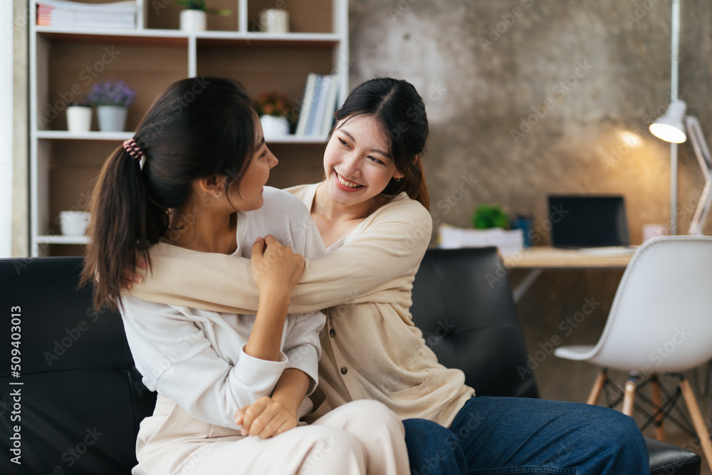 LGBT Lesbian couple love moments happiness , lovely lesbian couple spending time together and having fun at living room, LGBT concept. LGBT Lesbian couple love moments happiness , lovely lesbian couple spending time together and having fun at living room, LGBT concept.