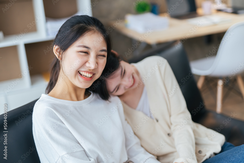 LGBT Lesbian couple love moments happiness , lovely lesbian couple spending time together and having fun at living room, LGBT concept. LGBT Lesbian couple love moments happiness , lovely lesbian couple spending time together and having fun at living room, LGBT concept.