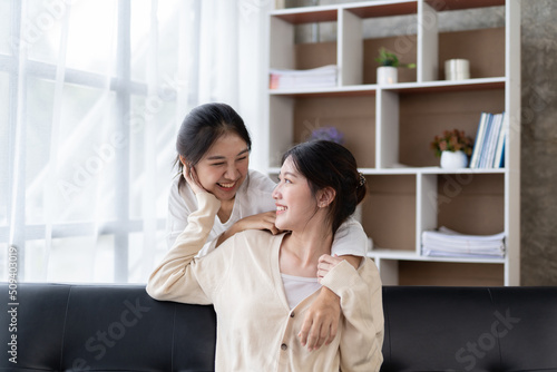 LGBT Lesbian couple love moments happiness , lovely lesbian couple spending time together and having fun at living room, LGBT concept.