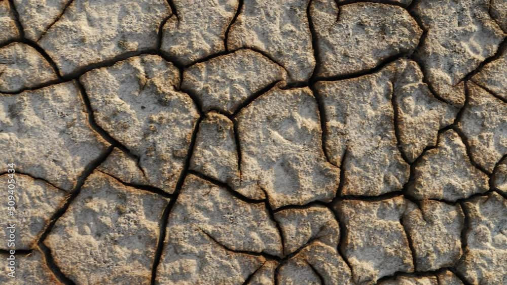 Close-up shot of cracked soil ground of dried lake or river. Close-up shot of cracked soil ground of dried lake or river.