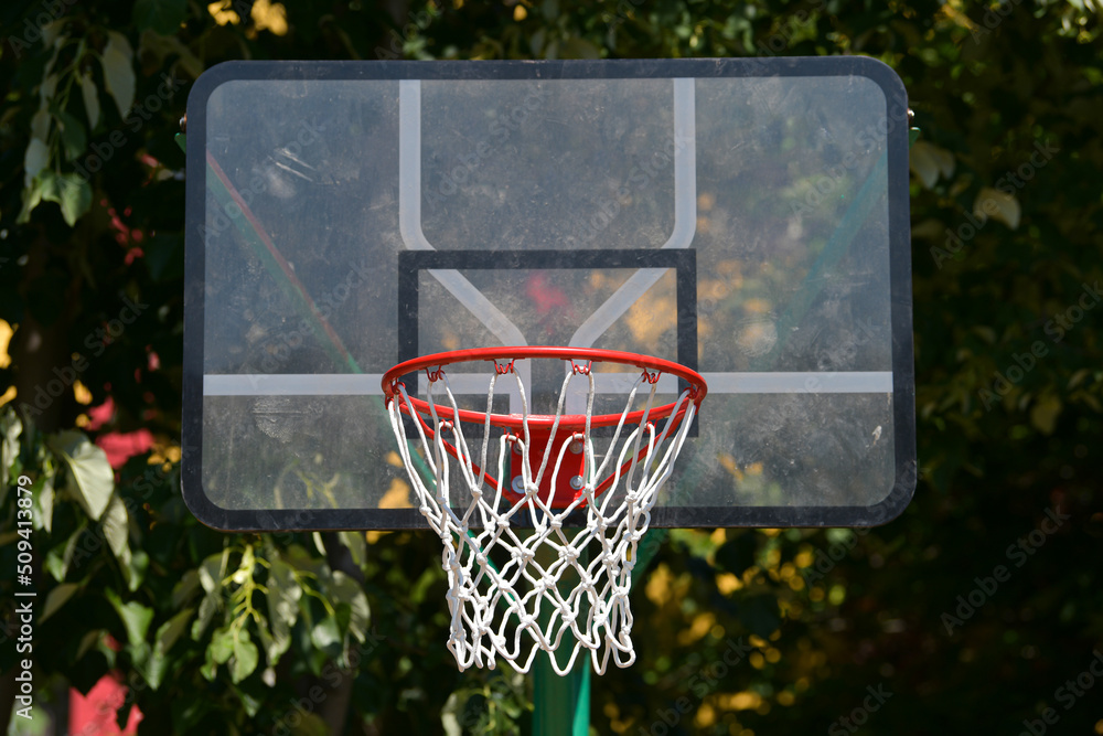 New basketball hoop basket on a sports playground that is used for training.