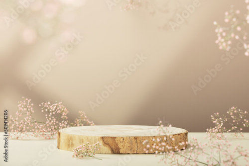 Wood slice podium and pink flowers. Concept scene stage showcase for new product, promotion sale, banner, presentation, cosmetic