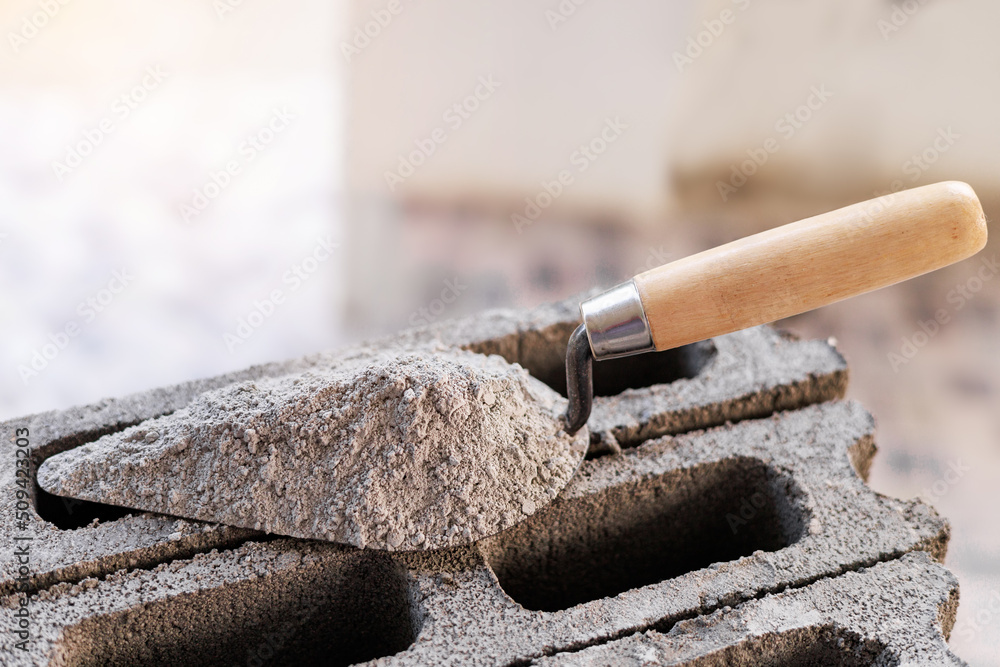 Cement or mortar, Cement mix or cement powder with a trowel put on the