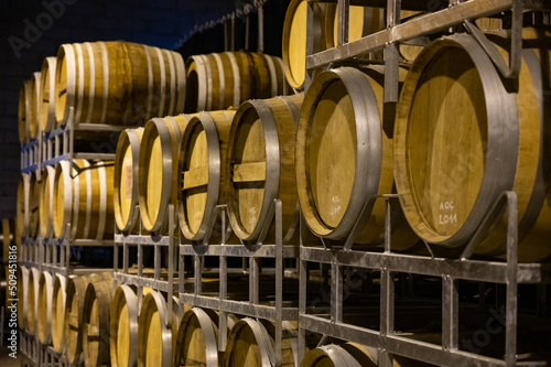 Production of sweet cassis creme liquor and strong marc from ripe black currant berries, distillation and maturation in wooden barrels. Burgundy, France