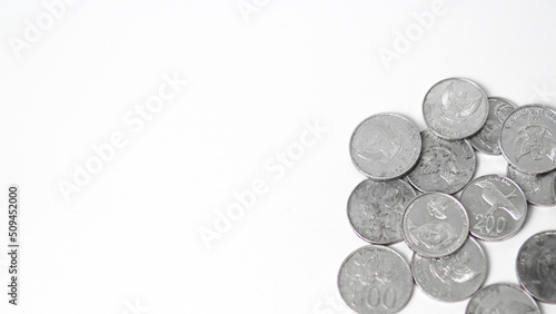 Collection of coins on a white background