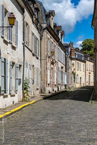 Senlis  medieval city in France  typical cobblestone street with ancient houses 