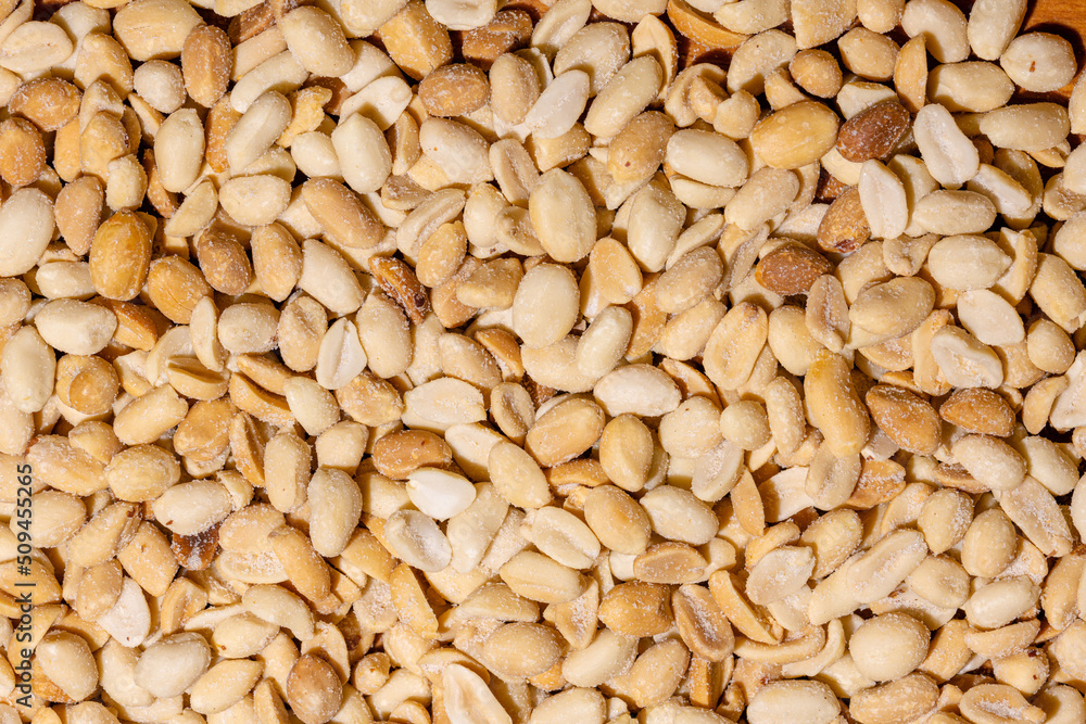 Dry Peanuts Salted Roasted without skin top view background or texture. Healthy spices, nuts, seeds and herbal products. Macro photo. Dry Peanuts Salted Roasted without skin top view background or texture. Healthy spices, nuts, seeds and herbal products. Macro photo.