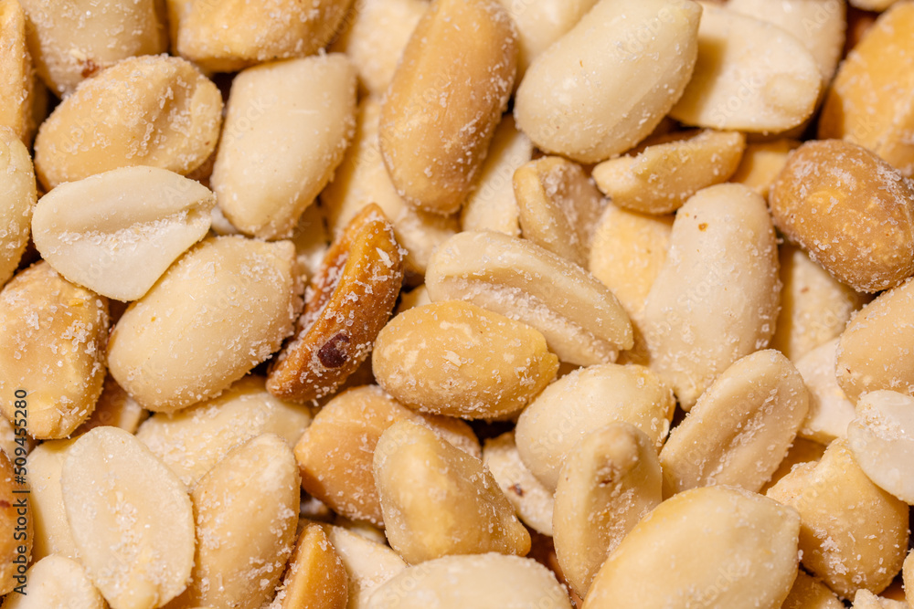 Dry Peanuts Salted Roasted without skin top view background or texture. Healthy spices, nuts, seeds and herbal products. Macro photo. Dry Peanuts Salted Roasted without skin top view background or texture. Healthy spices, nuts, seeds and herbal products. Macro photo.