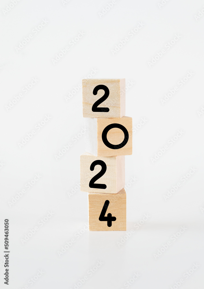Cubic wooden blocks forming the '2024' text Cubic wooden blocks forming the '2024' text