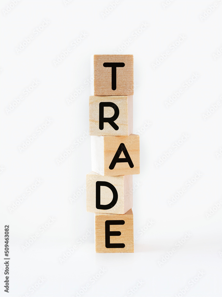 Cubic wooden blocks forming the 'trade' text Cubic wooden blocks forming the 'trade' text