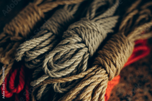 Brown fabric ropes for tying shibari photo