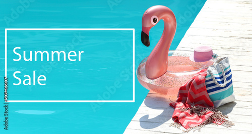 Photography Inflatable ring and beach accessories on edge of swimming pool