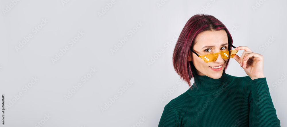 Web banner Studio portrait Woman with bright red Color hair. Vivid color hair dye. Web banner Studio portrait Woman with bright red Color hair. Vivid color hair dye.